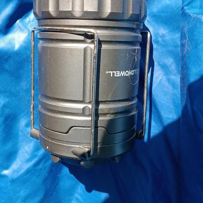 "Mummy bag" sleeping bag with cover and a Bell Howell lantern