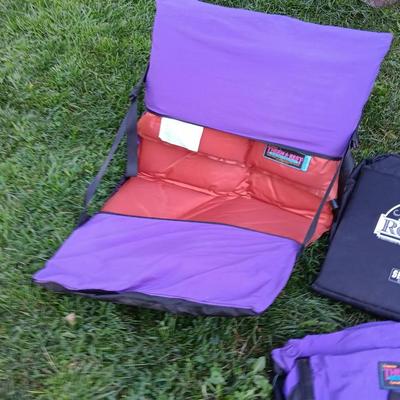 Two Therma-a- rest chairs and a Rockies stadium seat