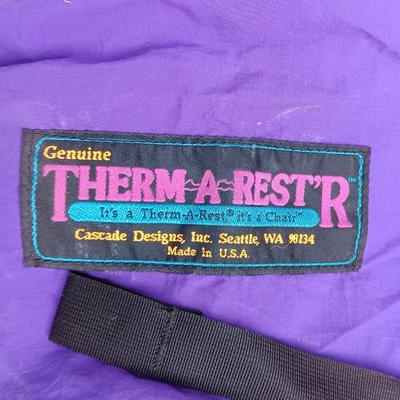 Two Therma-a- rest chairs and a Rockies stadium seat