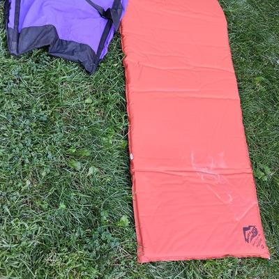 Two Therma-a- rest chairs and a Rockies stadium seat