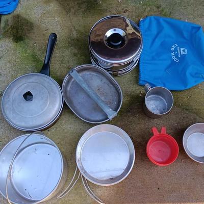 Camping pots, pans, and set of pans in nylon bag