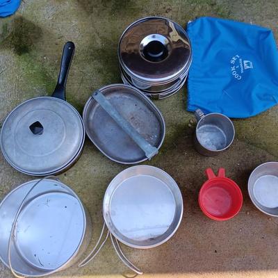 Camping pots, pans, and set of pans in nylon bag