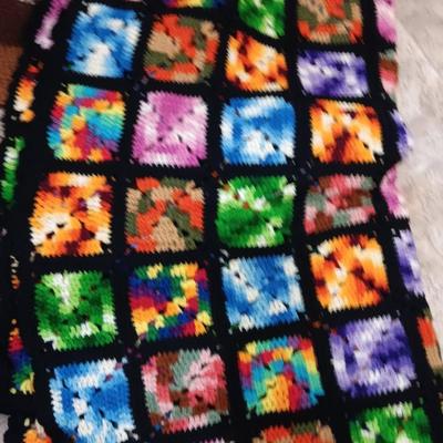 Three crocheted Afghans