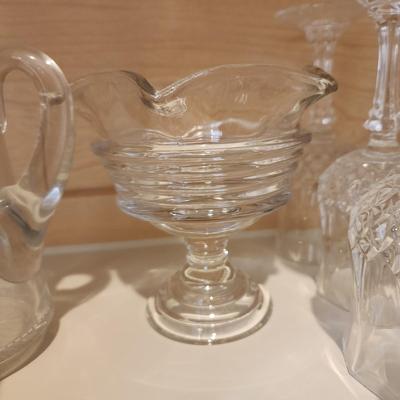 Kitchen Cabinet of Glasses , Bowls, Coke Coca Cola Glasses