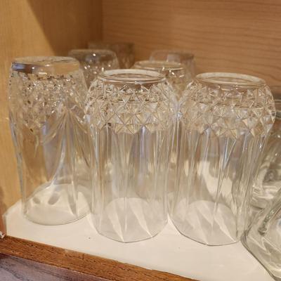 Kitchen Cabinet of Glasses , Bowls, Coke Coca Cola Glasses