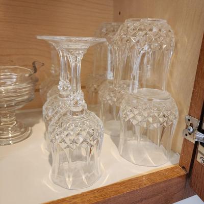Kitchen Cabinet of Glasses , Bowls, Coke Coca Cola Glasses
