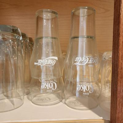 Kitchen Cabinet of Glasses , Bowls, Coke Coca Cola Glasses