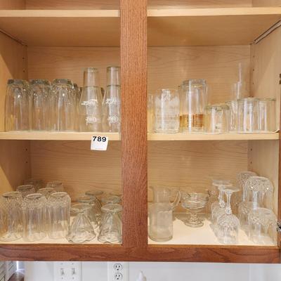 Kitchen Cabinet of Glasses , Bowls, Coke Coca Cola Glasses