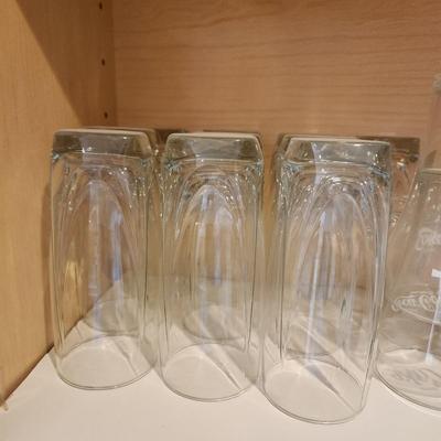 Kitchen Cabinet of Glasses , Bowls, Coke Coca Cola Glasses