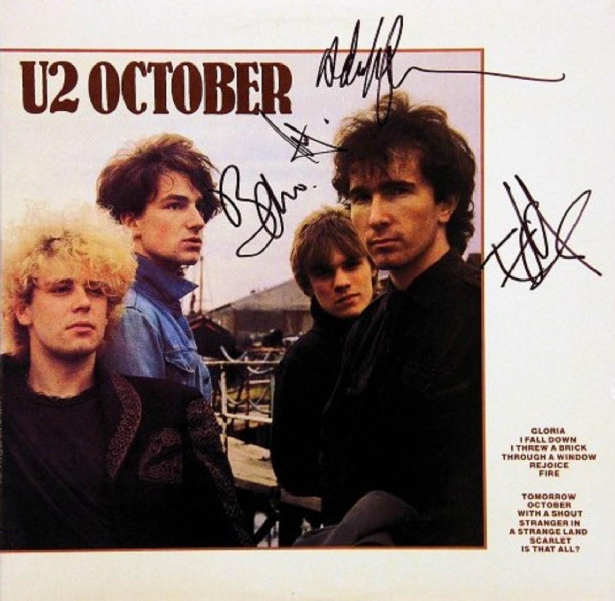 U2 signed "October" album | EstateSales.org