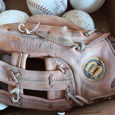 Baseballs and Softballs with bats and tall crate perfect to hold your bats!