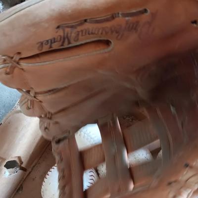 Baseballs and Softballs with bats and tall crate perfect to hold your bats!