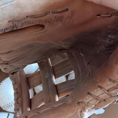 Baseballs and Softballs with bats and tall crate perfect to hold your bats!