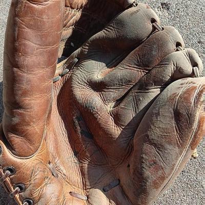 Another older Baseball Glove with ball