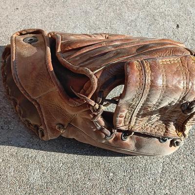 Another older Baseball Glove with ball