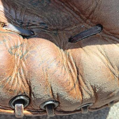 Another older Baseball Glove with ball