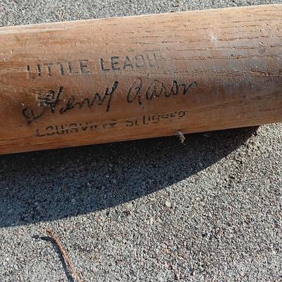 Louisville Slugger I25J Wooden baseball bat with Wilson glove and a ball