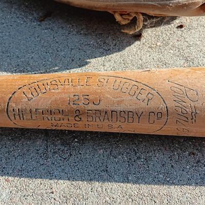Louisville Slugger I25J Wooden baseball bat with Wilson glove and a ball