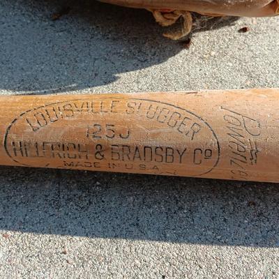 Louisville Slugger I25J Wooden baseball bat with Wilson glove and a ball