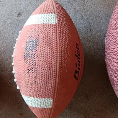 Three Footballs