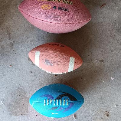Three Footballs