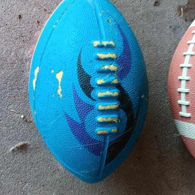 Three Footballs