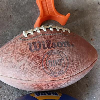 Two footballs and a kickoff tee- Wilson - Napa