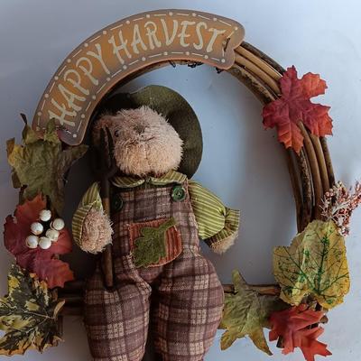 Fall Decorations for your home - pumpkins - scarecrow - tablecloth- miniature straw bales.