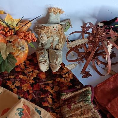Fall Decorations for your home - pumpkins - scarecrow - tablecloth- miniature straw bales.
