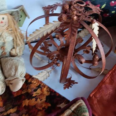 Fall Decorations for your home - pumpkins - scarecrow - tablecloth- miniature straw bales.