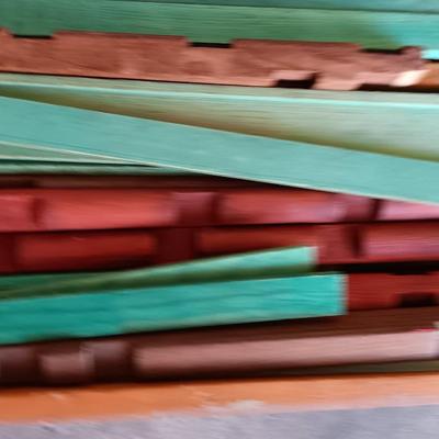 Vintage Lincoln logs in a wooden box with instructions