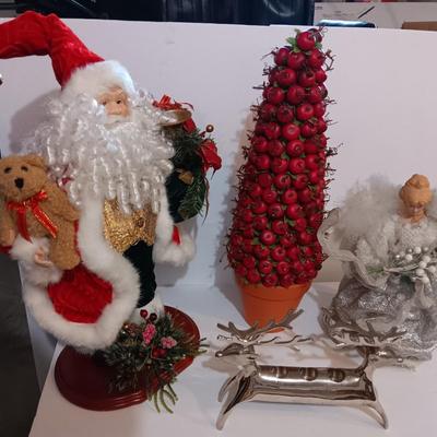 Large Santa figure, Angel, Apple Christmas tree and a Reindeer candle holder Christmas will be here before you know it!