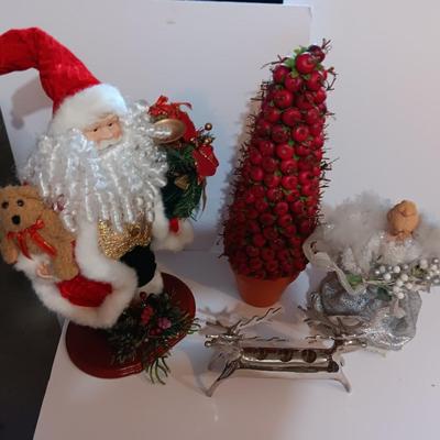 Large Santa figure, Angel, Apple Christmas tree and a Reindeer candle holder Christmas will be here before you know it!
