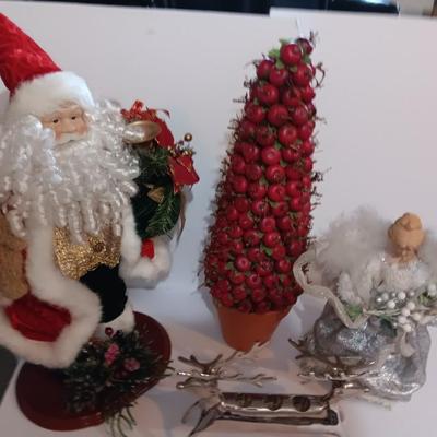 Large Santa figure, Angel, Apple Christmas tree and a Reindeer candle holder Christmas will be here before you know it!