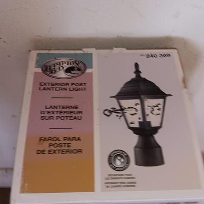New Hampton Bay Exterior post Lantern Light and a inside globe light