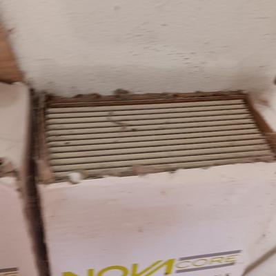 Two boxes of flooring oca acre Luxury floor plank with nova click