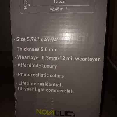 Two boxes of flooring oca acre Luxury floor plank with nova click