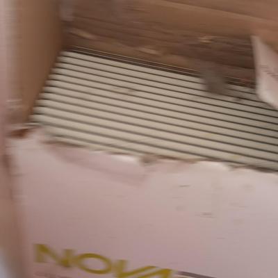 Two boxes of flooring oca acre Luxury floor plank with nova click