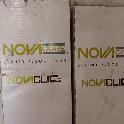 Two boxes of flooring oca acre Luxury floor plank with nova click