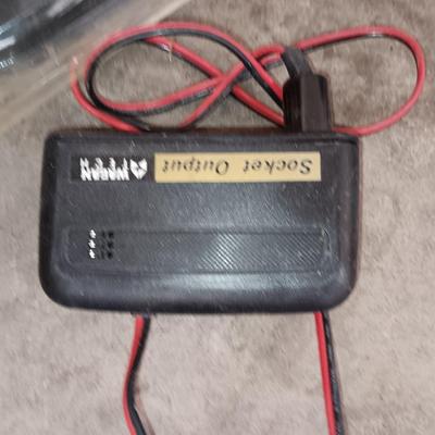 Automobile items - Jumper cables- new mud flaps -Good fire extinguisher wheel covers and more