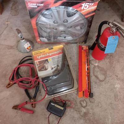 Automobile items - Jumper cables- new mud flaps -Good fire extinguisher wheel covers and more