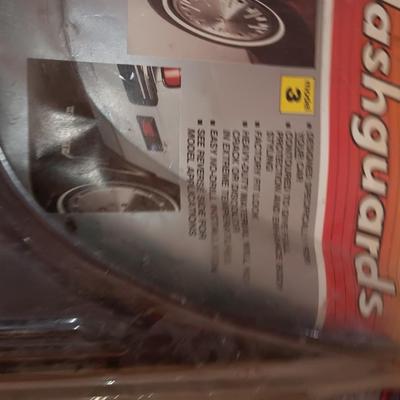 Automobile items - Jumper cables- new mud flaps -Good fire extinguisher wheel covers and more