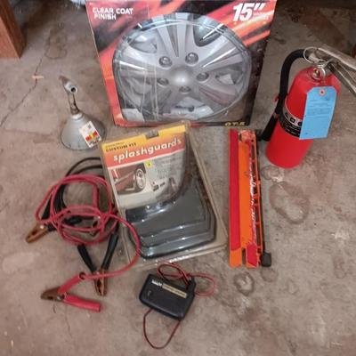 Automobile items - Jumper cables- new mud flaps -Good fire extinguisher wheel covers and more