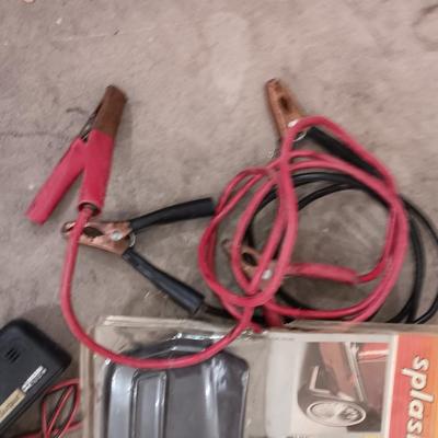 Automobile items - Jumper cables- new mud flaps -Good fire extinguisher wheel covers and more