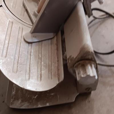 Industrial metal electric meat or cheese slicer