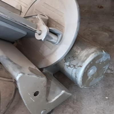 Industrial metal electric meat or cheese slicer