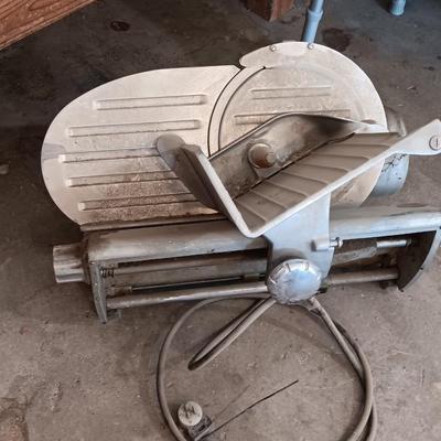 Industrial metal electric meat or cheese slicer