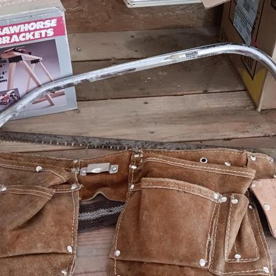 Two new sawhorse brackets and some hand saws and leather tool pouch