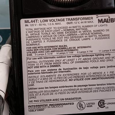 Orbit Hose Faucet Timer new in the pack, and a Malibu timer