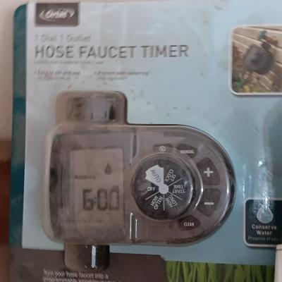 Orbit Hose Faucet Timer new in the pack, and a Malibu timer